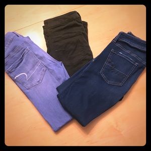Three pairs of jeans from American Eagle.